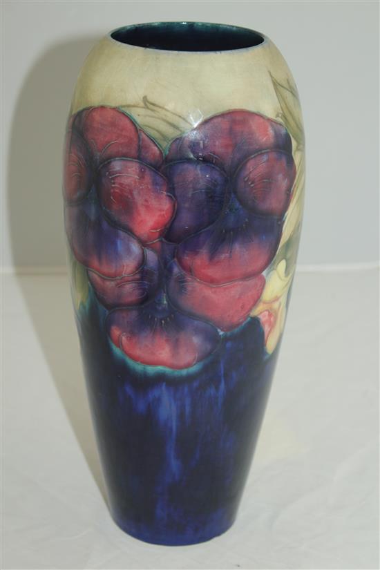 Two William Moorcroft pansy pattern vases, c.1917, 27cm, latter vase repaired